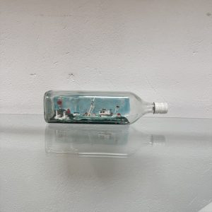 Antieke vissersboot in fles